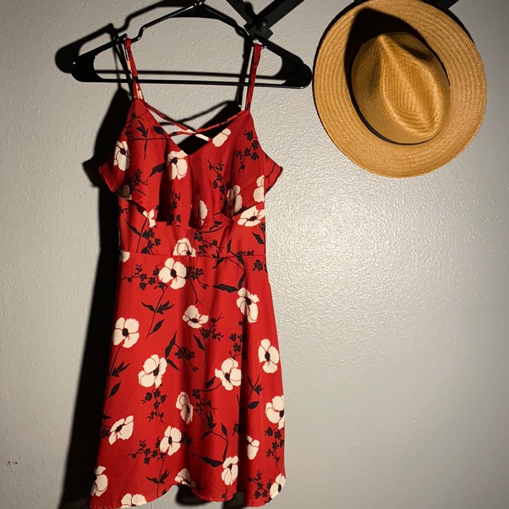 Trixxi red floral dress is a Small.